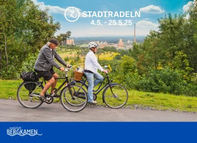 Initiative Stadtradeln: zwei Fahrradfahrer auf dem Weg zur Halde