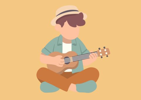 Kind spielt Ukulele